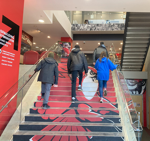 students walking up stairs at keene state college